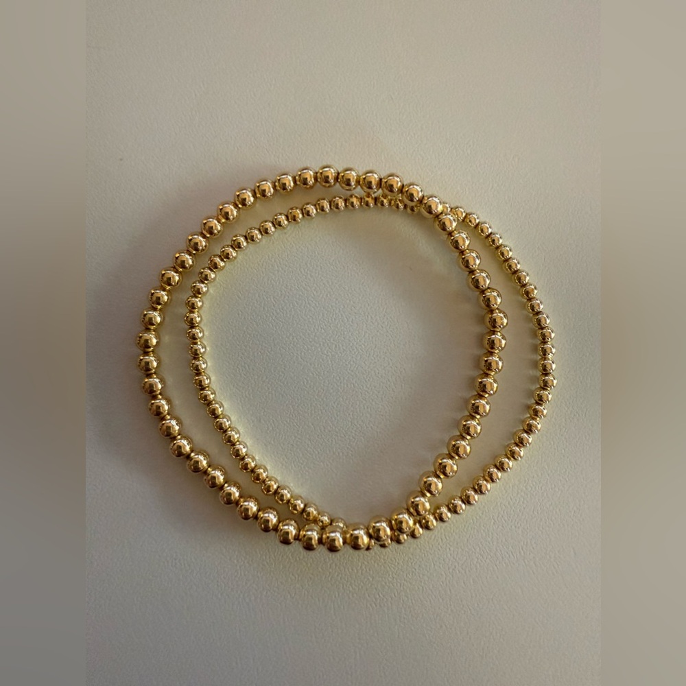 2 gold plated bead bracelets (different sizes in beads) - size 7.25in